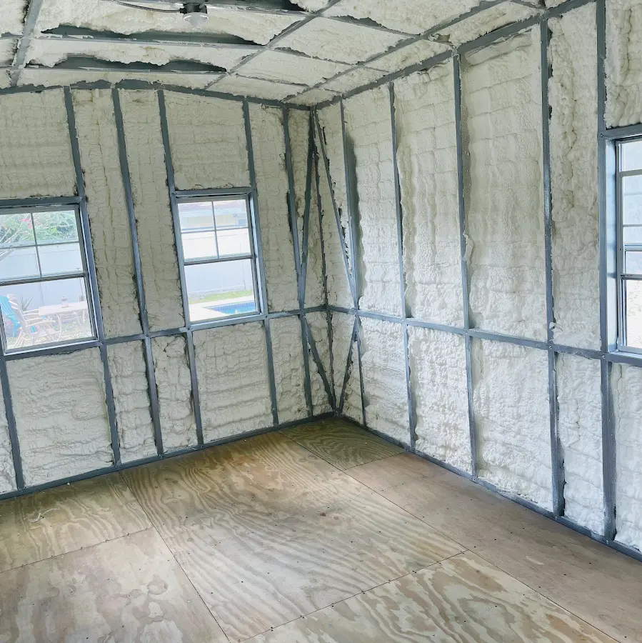 Closed-cell spray foam insulation applied to wall cavities in a residential project in Holtville